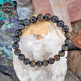 Bracelet Œil de Faucon d'Afrique du Sud de Grade A Boules de 8 mm sur une géode de quartz