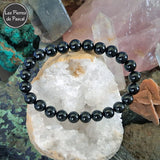 Bracelet "Protection avec Ancrage dans la Réalité" avec de la Tourmaline Noire du Brésil Boules de 8 mm sur une géode de quartz