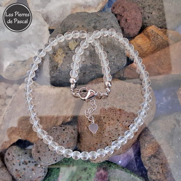 Réalisation d'un Collier en Cristal de Roche du Brésil Grade 3A Boules de 8 mm de 43 cm + 4 cm sur des pierres de lave