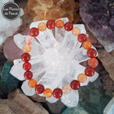 Commande Aurélie C. - Bracelet avec Cornaline et Jaspe Rouge de 8 mm Taille 18 cm sur une druse de cristal