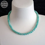 Commande Spéciale Nadine F. - Collier Amazonite Bleue 6 mm de 35 cm sur un buste blanc