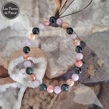 Commande Spéciale Lilu K. - Bracelet avec Jaspe Kamba Rhodochrosite Kunzite de 8 mm Taille 21 cm sur une géode de quartz