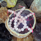 Perles en Quartz Rose de 8 mm de Qualité A du Brésil sur une tranche d'agate