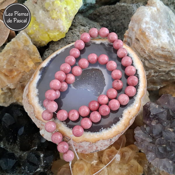 Perles en Rhodonite D'Australie 8 mm de Grade A sur une tranche d'agate