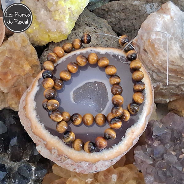 Fil de Perles en Œil de Tigre de 8 mm Qualité 2A d'Afrique du Sud sur une Tranche d'Agate